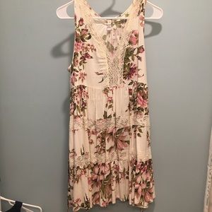 White dress with floral print with a lacy design